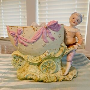 Boy with cart figurine